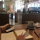coffee shop with paper turning in book